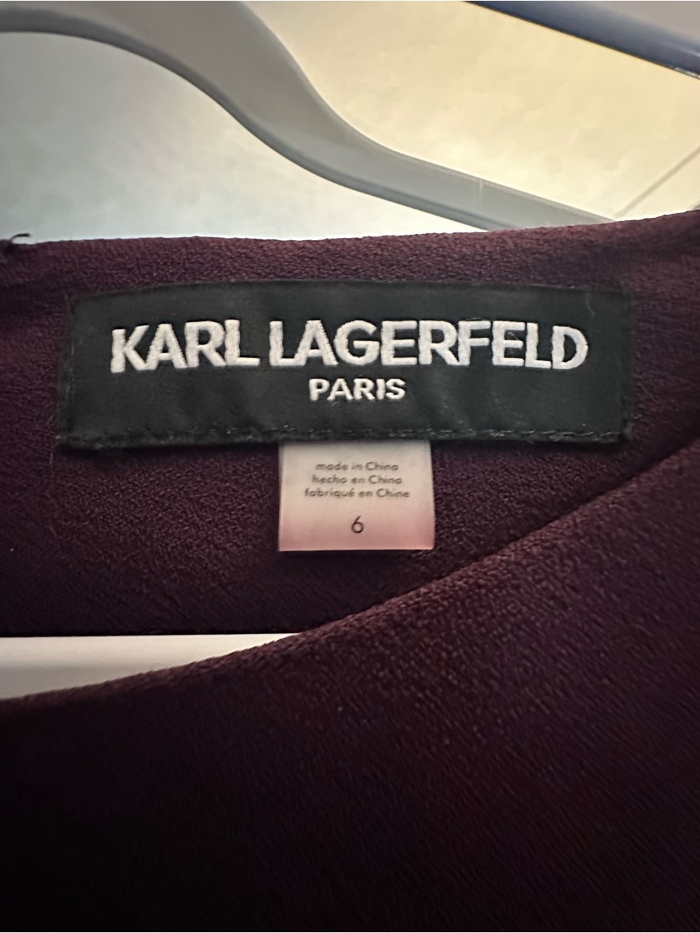 Label-only image of a women's jacket/coat